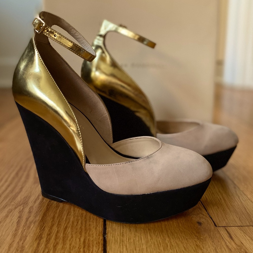 Loeffler Randall gold and black size 7.5 platform heels.